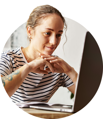woman looking at laptop